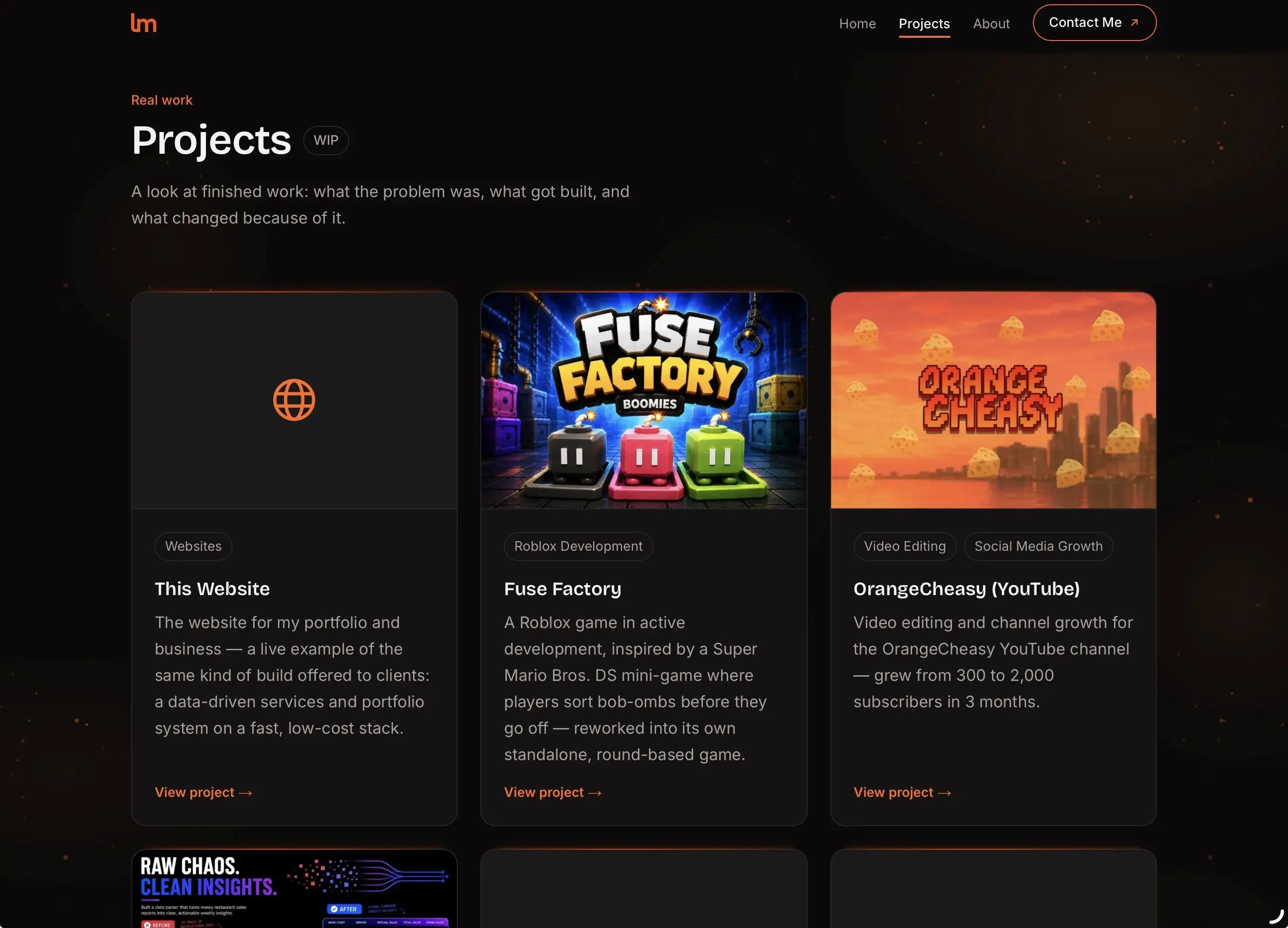 The liamthemo.com Portfolio page after the dark/orange redesign.